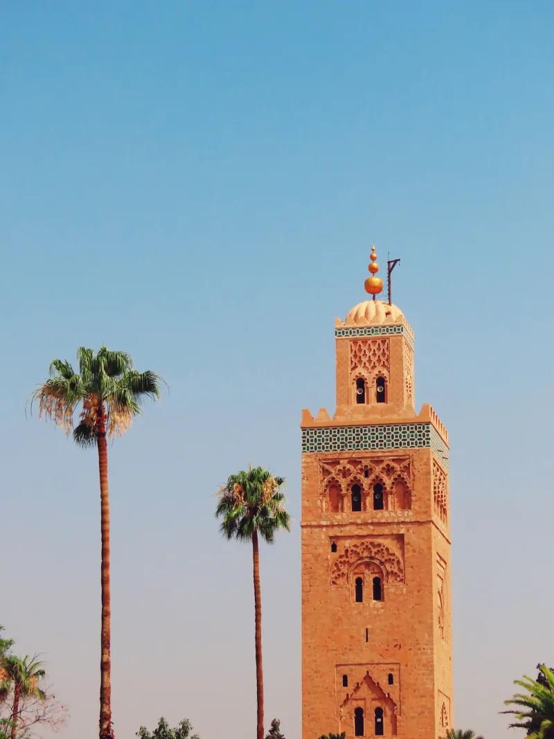 Koutoubia Mosque rising above palm trees