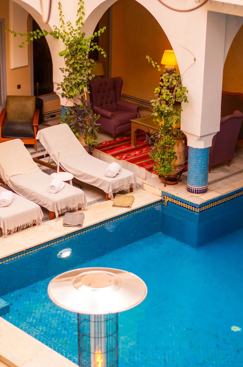 Riad courtyard with a tiled swimming pool